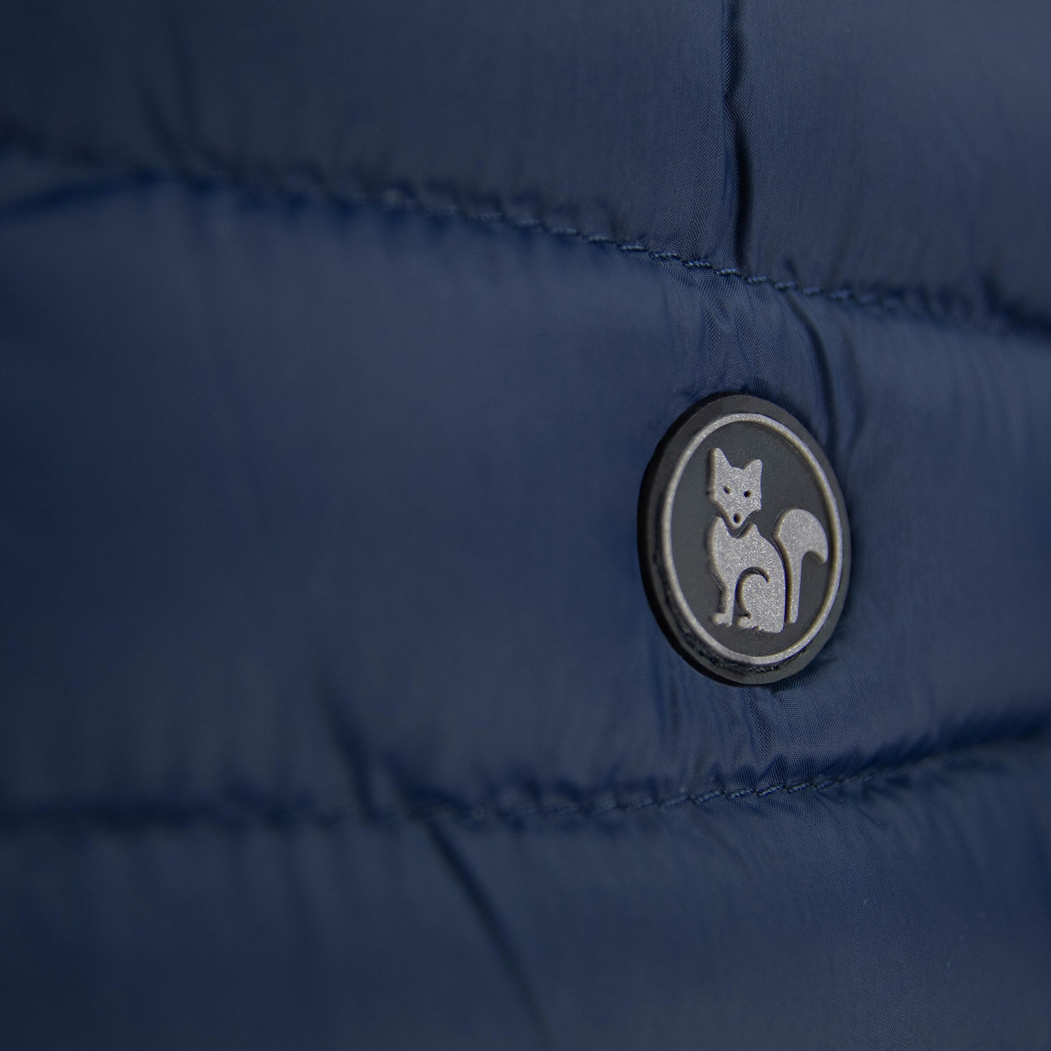 Colete infantil puffer Nagano reversível forrado com capuz