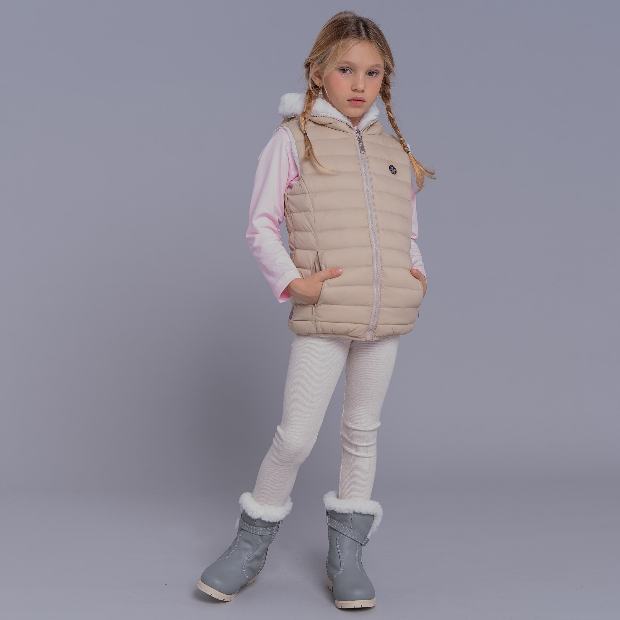 Colete infantil puffer Nagano reversível forrado com capuz
