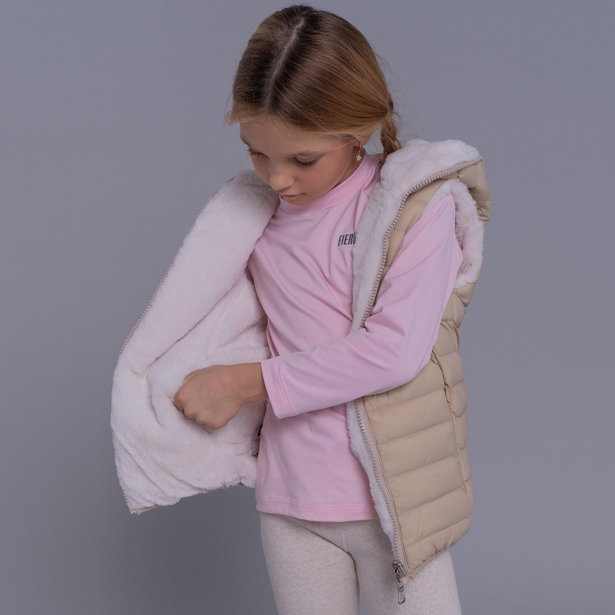 Colete infantil puffer Nagano reversível forrado com capuz