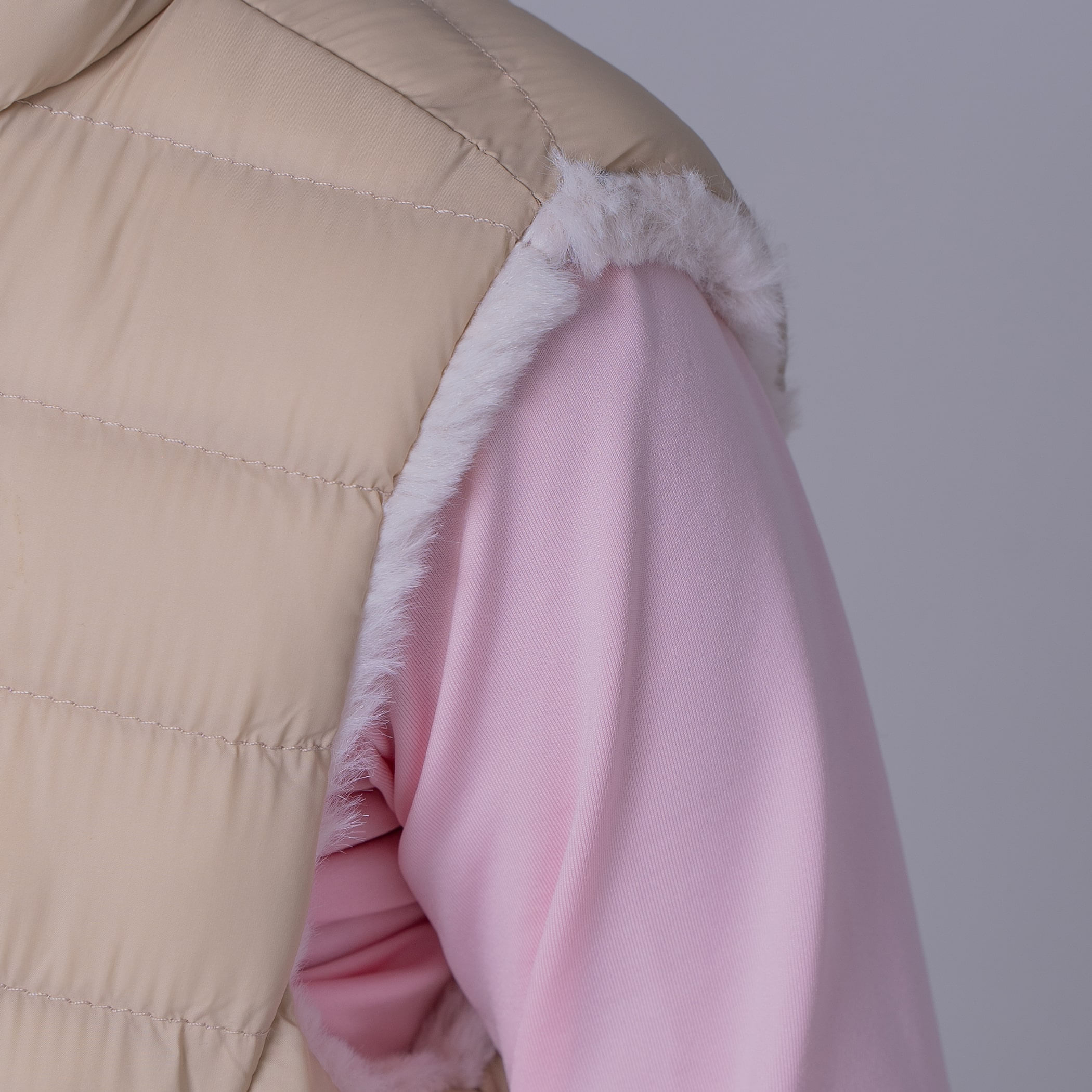 Colete infantil puffer Nagano reversível forrado com capuz
